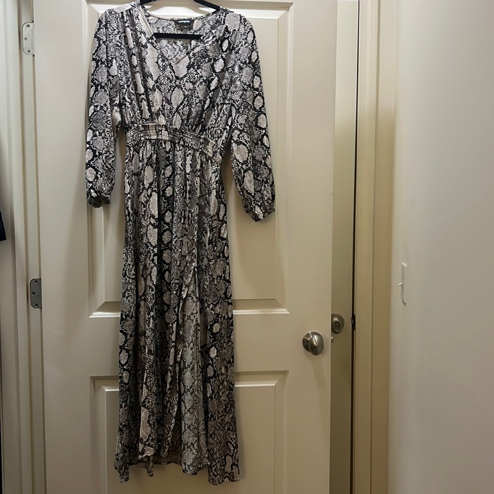 Express snake skin long maxi dress. Long sleeve with slit and v neck.